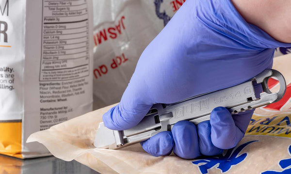 OLFA-SK-14-Safety-Knife-Opening-a-Bag