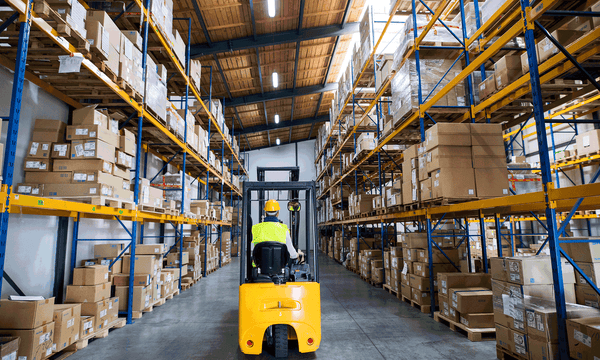 Man-in-Warehouse-with-packages-and-boxes-safety