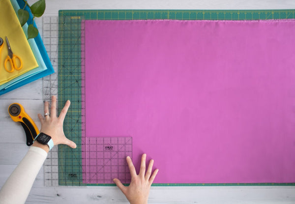 Squaring the fabric edge – two ruler method