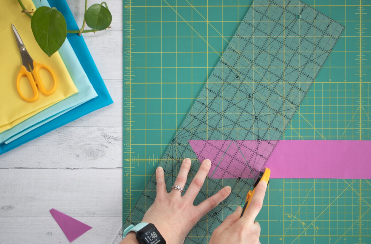 Cutting 60-degree triangles from strips