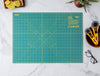OLFA FCM-17x24 17" x 24" Folding Cutting Mat For Rotary Cutters And Art Knives And Graphic Knives laying flat
